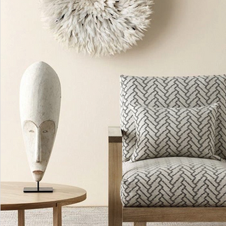 Modern living room with African mask | Vacation Rental Design | DIONE Interiors | Afrofusion Style