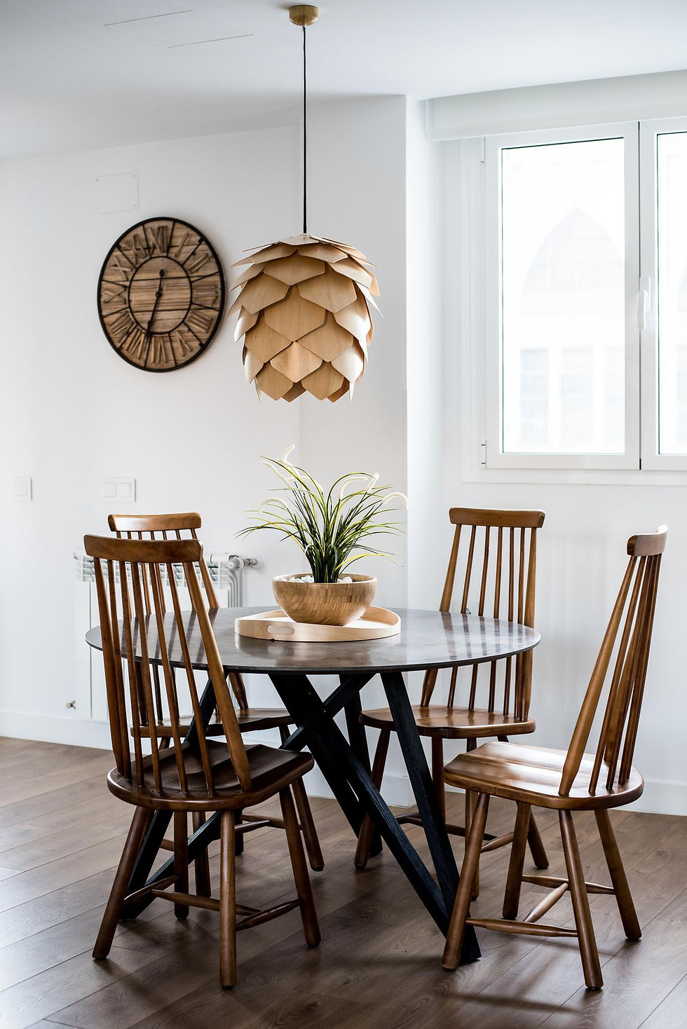 Round table and cone shaped light | DIONE Interiors Blog | Décor Trends for Spring-Summer 2024