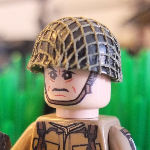 Miniature : US Army M1 Helmet With Netting Cover