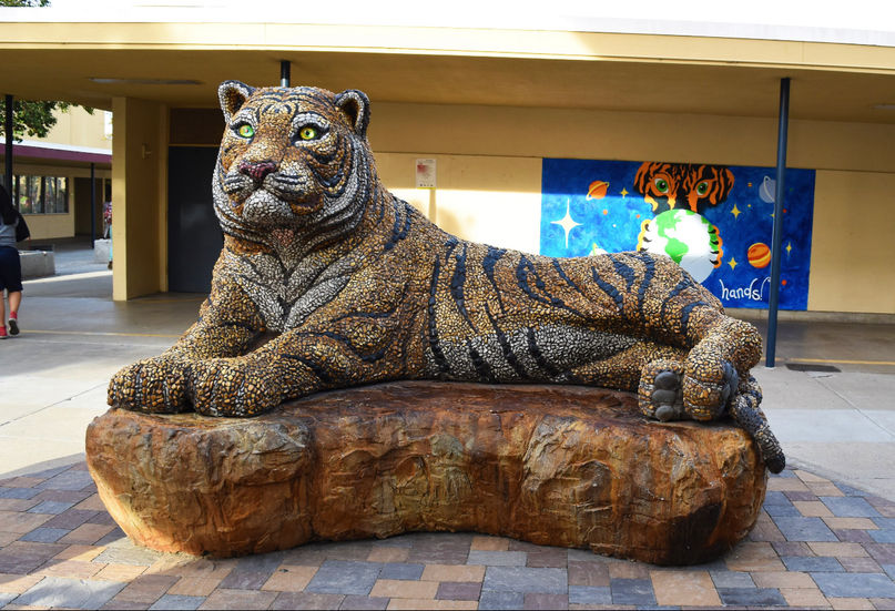 Front view of tiger bench sculpture at Wilson Middle School.