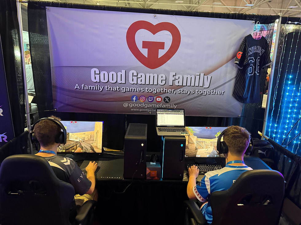 Competitors playing in the CS2 1v1 Aim Challenge at the Charity Booth.