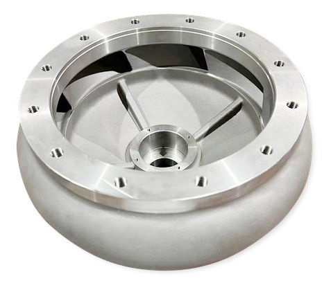 High angle view of an investment cast pump impeller with intricate blade design