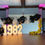 Thumbnail: Big balloon garland: Colors: black, white and zebra. A big golden balloon chain and big light "1982" letters
