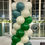 Thumbnail: Balloon pillar. Colors: white, green, blue. Topper: big white balloon with a hand logo