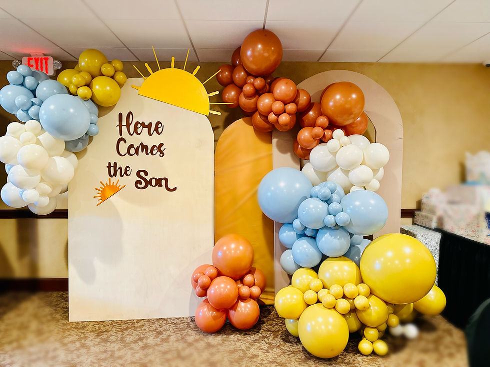 Thumbnail: Balloom garland. Colors: yellow, blue, white, orange. Backdrop with sun cut-outs and text "here comes the son"