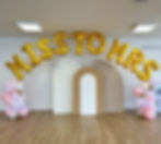 Golden Letter balloon statement saying "miss to mer"