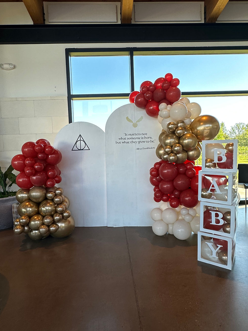 Thumbnail: Balloom garland. Colors: red, golden, white with a white backdrop. Balloon filled boxes spelling "baby"