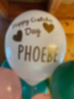 Thumbnail: A big white balloon with text "Happy gotcha day Phoebe"