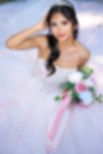 Birthday celebrant posing with bouquet of flowers