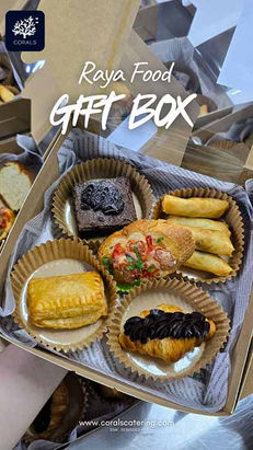 CORALS Catering premium Hari Raya pastry gift box featuring golden curry puffs, crispy spring rolls, mushroom bruschetta, rich chocolate croissant, chocolate brownie, and elegant festive gift box packaging for corporate and festive gifting in Malaysia.