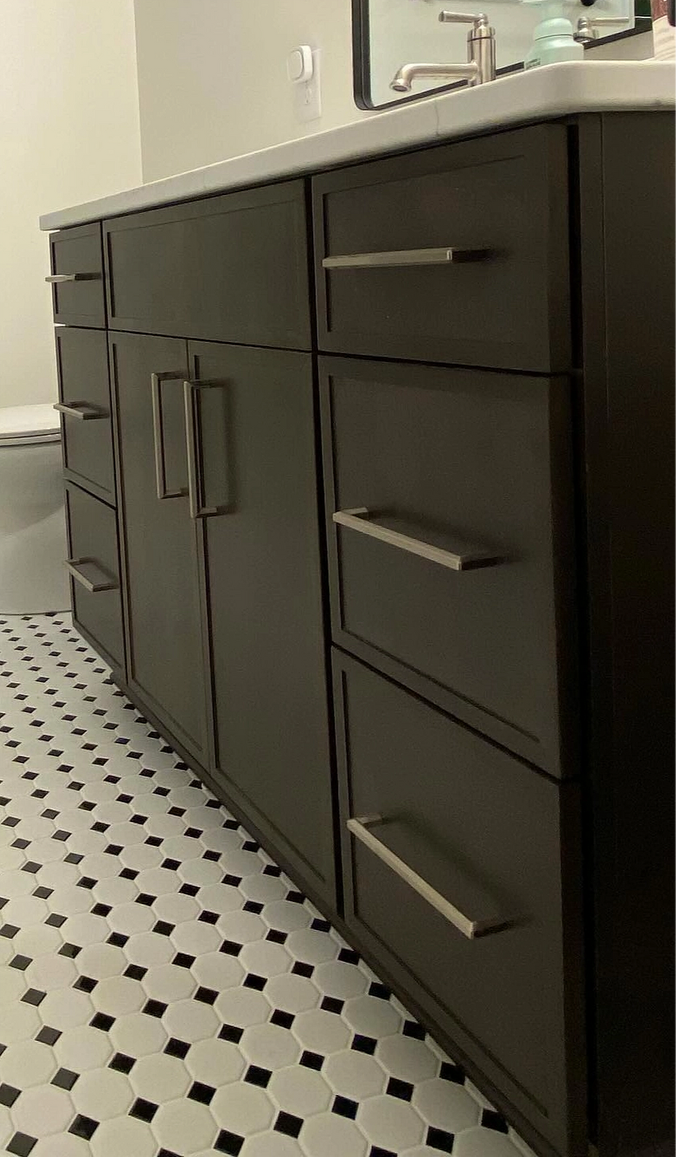 Eye-level view of wooden kitchen cabinet doors with soft-close hinges