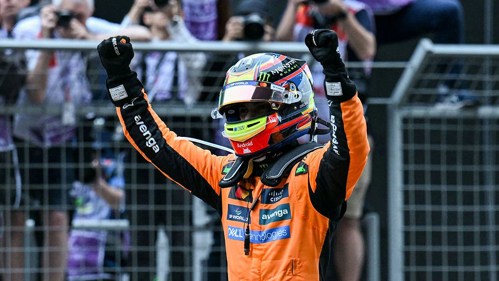 Oscar Piastri celebrating his victory at the Chinese Grand Prix. (Photo by Hector Retamal/AFP/Getty Images)