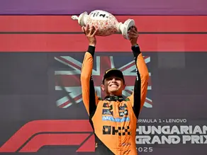 Norris holds on to clinch victory in Budapest