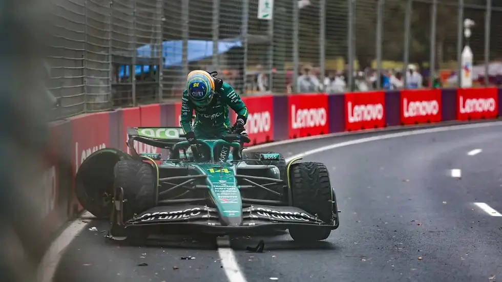 Fernando Alonso exiting his Aston Martin Mercedes after crashing out on lap 34. (Photo by Elizabeth Blackstock)