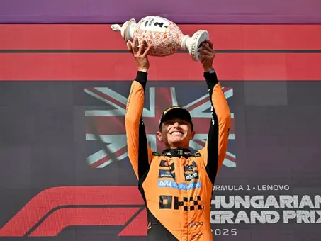 Norris holds on to clinch victory in Budapest