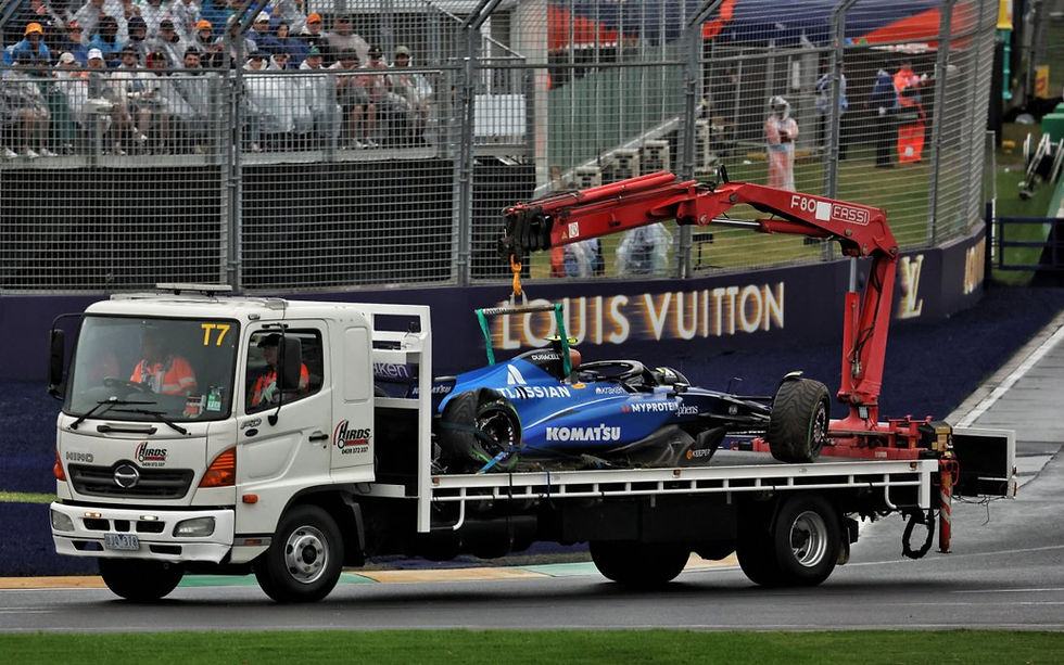 Carlos Sainz' Williams Mercedes being Carried away after his spin in the final corner (Photo by © XPBimages)