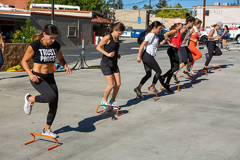 STRUT FITNESS TEAM MEMBERS WORKING OUT.