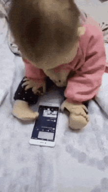baby-scrolls-phone-phone.gif
