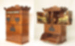 Antique wooden postal machine with intricate carvings, open to reveal inner mechanisms. Japanese text on top. Warm, vintage setting.
