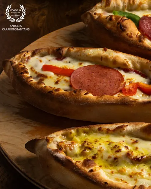 food photography Foodelia pizza with melted cheese pepperoni and fresh ingredients, professional restaurant photography for menu delivery and branding

Photo and food styling by Antonis Karakonstantakis Fine Art Food Photographer commercial food photography pizza close up with crispy crust and toppings, high quality restaurant menu photography for branding advertising and online promotion