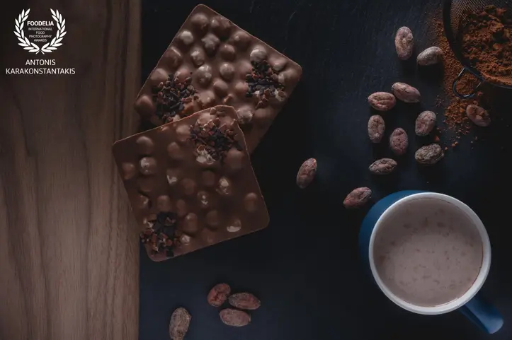 Foodelia chocolate bars with nuts cocoa beans and coffee cup, professional dessert photography for branding menu and product promotion
creative food photography chocolate composition with coffee and cocoa, commercial food styling for café branding product photography and visual identity