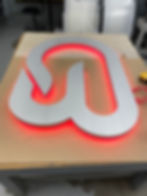 Brushed halo lit logo