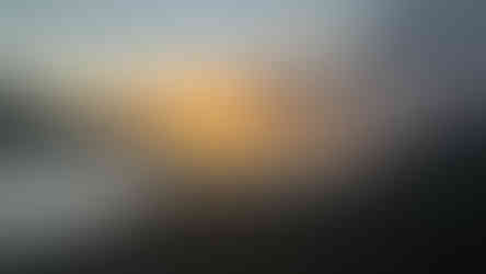 The sun peaks through the clouds