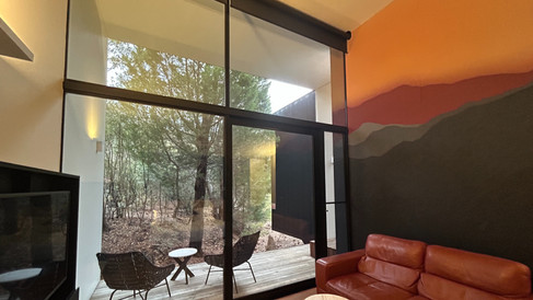 Having a look at the view of nature from the cozy lodge