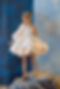 girl wearing satin one sleeve junior prom, P7 prom dress in a champagne colour