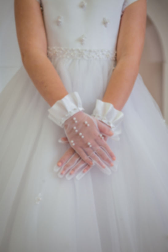 white mesh gloves with white satin ruffle wrist detailing with pearl detailing on the gloves