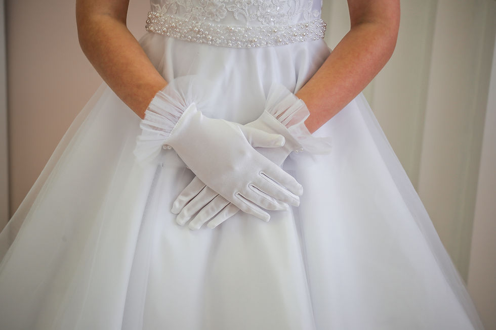 Crystal and Pearl Boutiques 2026 Communion accessory range. Satin communion gloves with tulle detailing