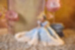 Thumbnail: blue and ivory ruffle dress with feather detailing on bodice with silver appliqué and floral detailing