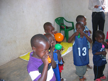 Nursery school playing with balloons in