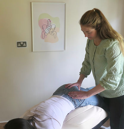 Prenatal chiropractor supporting pelvic balance