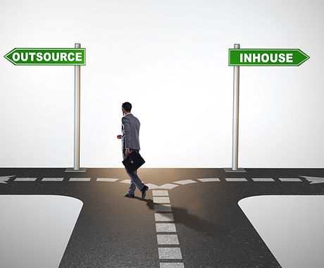 Businessman at crossroads deciding betwe