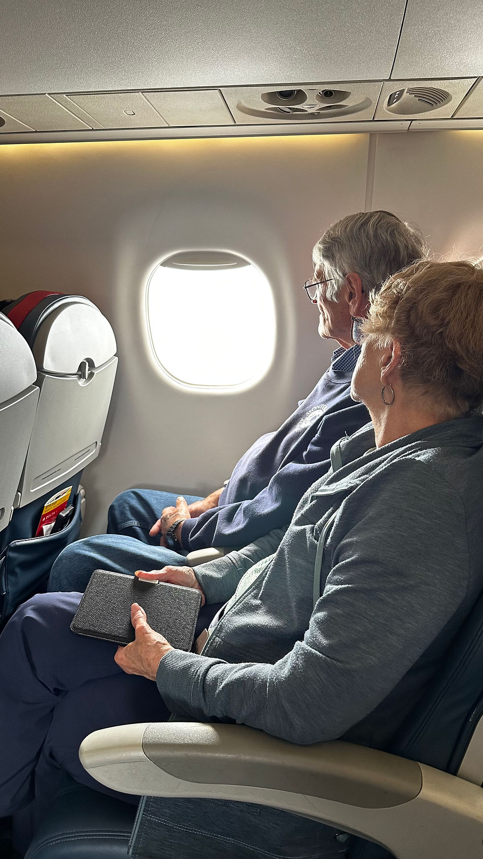 Mom and Dad on plane