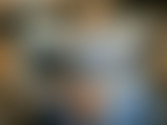 Person reading a financial planning book, representing financial literacy, money management education, and personal finance learning.