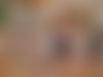 Working from home: A mother multitasks as she balances her remote work and spending quality time with her child.