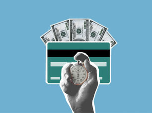 Hand holding a stopwatch in front of a credit card and cash, representing paying off debt faster.