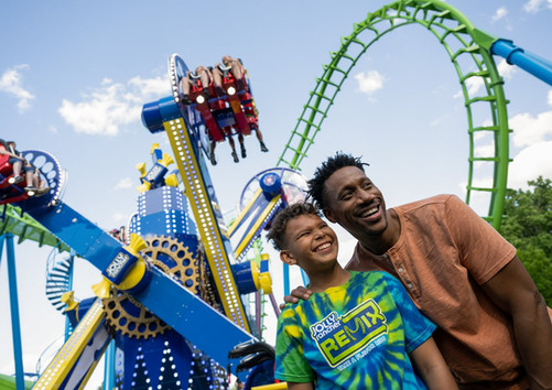 Chris Richardson with son at an amusement park