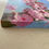 Thumbnail: Pink Cherry Blossoms in blue sky oil painting by artist Jenny Berry