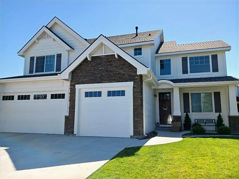 Full exterior house painting service in the Treasure Valley by Rocky Mountain Painting Contractors, featuring a professional, durable finish.