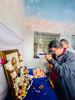 Local Director Sibasis Danda offering prayers to our Founder, Bhagabati Charan Ghosh during Inaugura