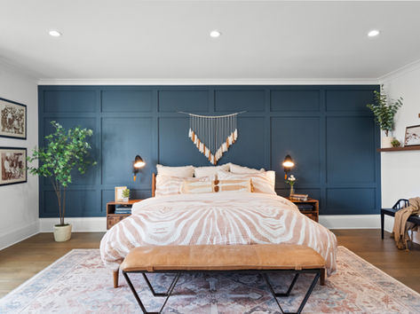 Westport Master Bedroom with dark accent wall and bohemian decor 