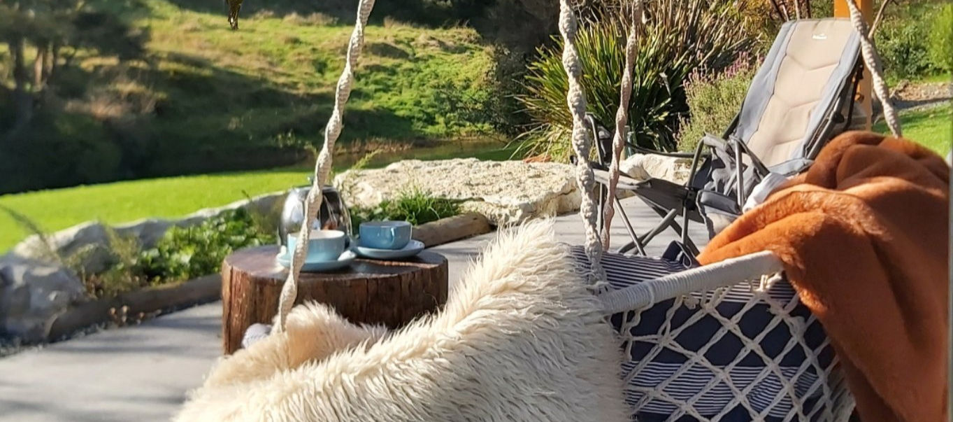 Cozy exterior decks under warm outdoor heaters, under cover so you can experience nature even when it's raining