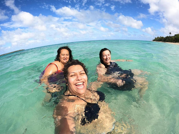 3 women swimming at Uoleva beach, Tonga