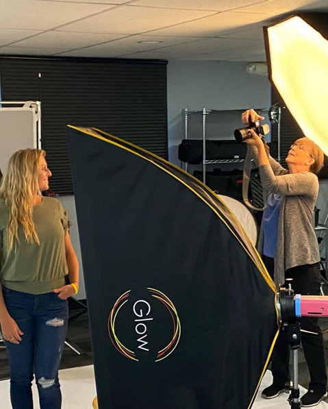 Kristi Gugel, of Gugel Photography taking picture of  Kori Steigerwald