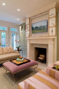 Wall tv hidden behind pictures