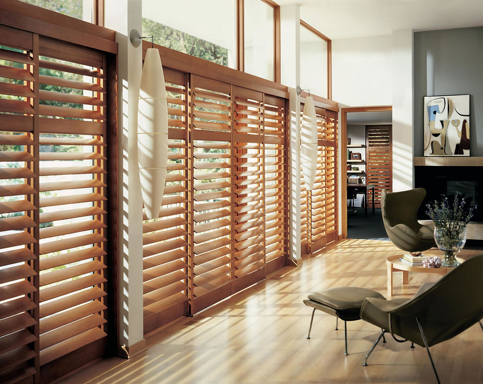 Wooden shutters over large lounge windows