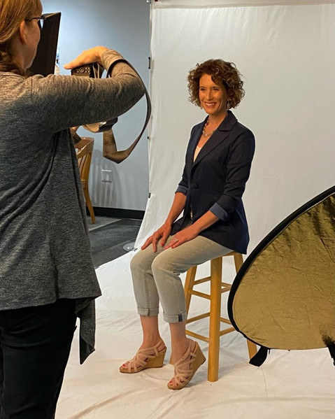 Kristi Gugel, of Gugel Photography taking picture of  Kori Steigerwald